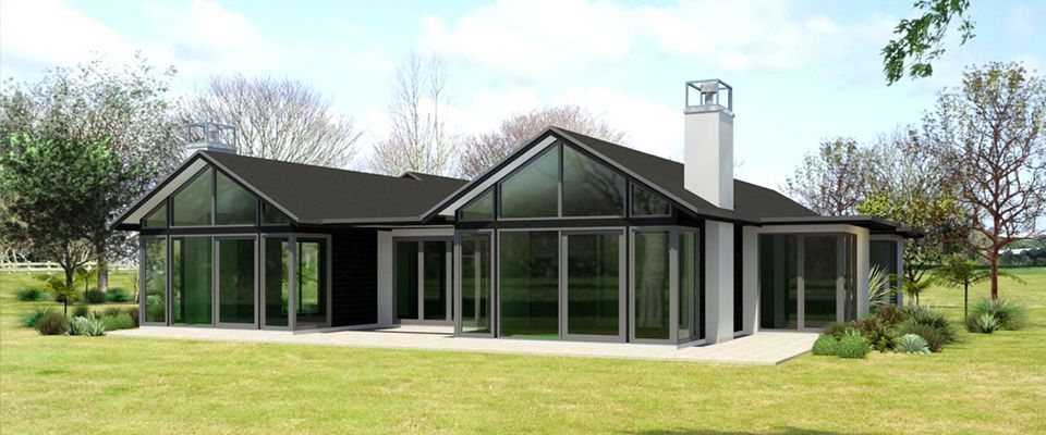 Twin gabled home with full height glazing and a plastered chimney set in rural paddocks
